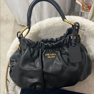 Prada Black Leather Shoulder Bag with Gold Accents